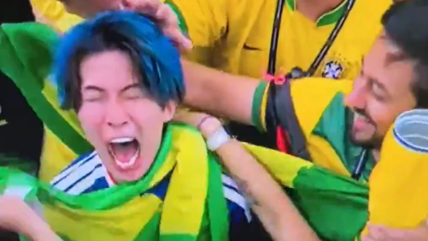 Torcedor do Japão é consolado por brasileiros após virada na Copa; veja