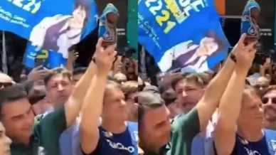 Flávio e Tarcísio erguem imagem de Nossa Senhora Aparecida após fake news